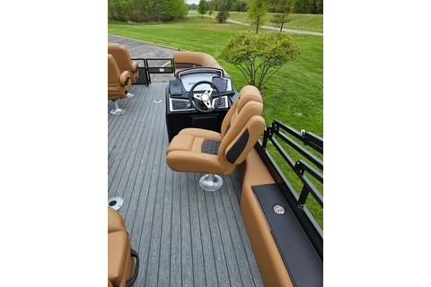 2026 Ranger 220FC boat interior with tan seating and modern dashboard.