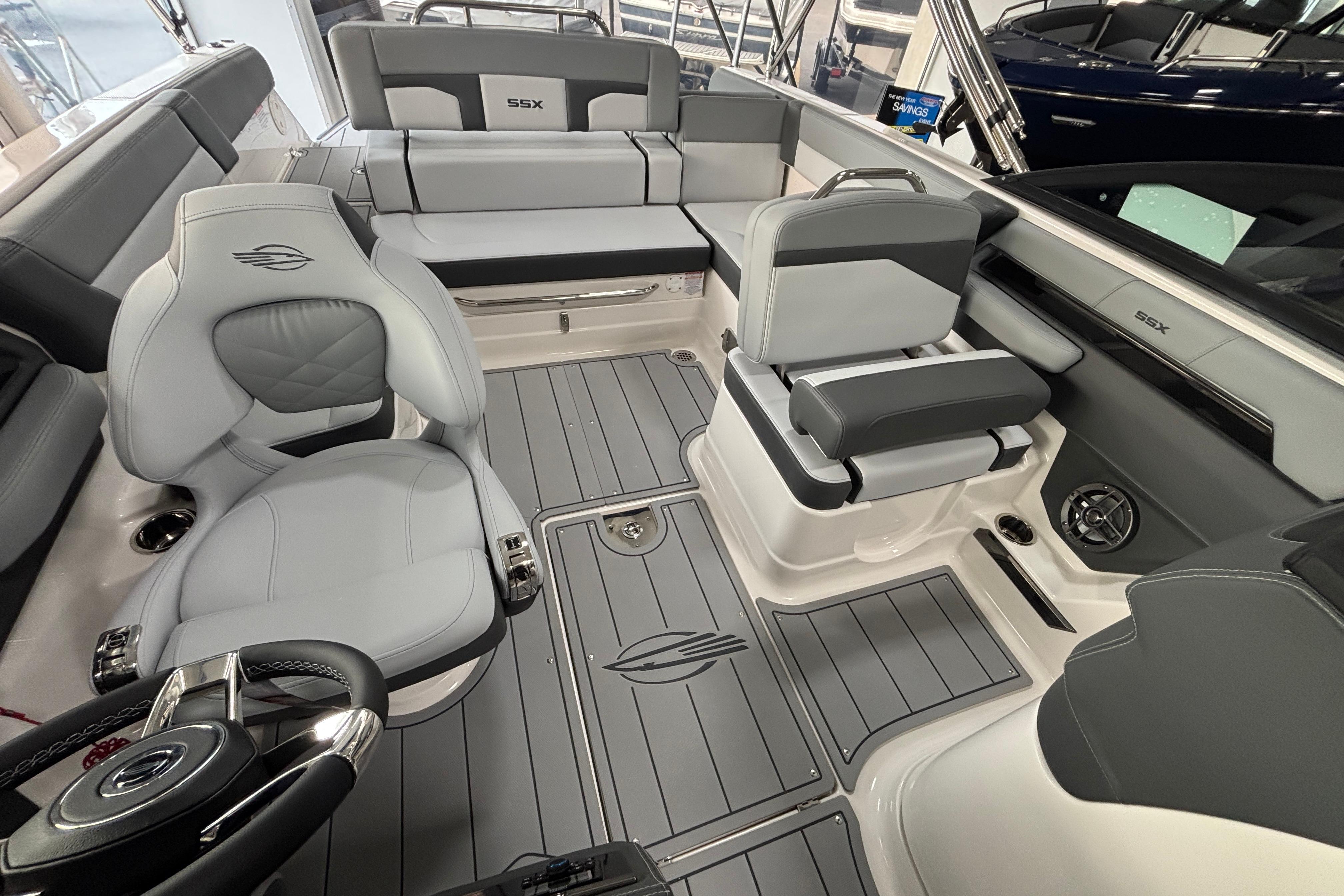 2026 Chaparral SSX 4 boat interior with sleek gray seating and modern design.