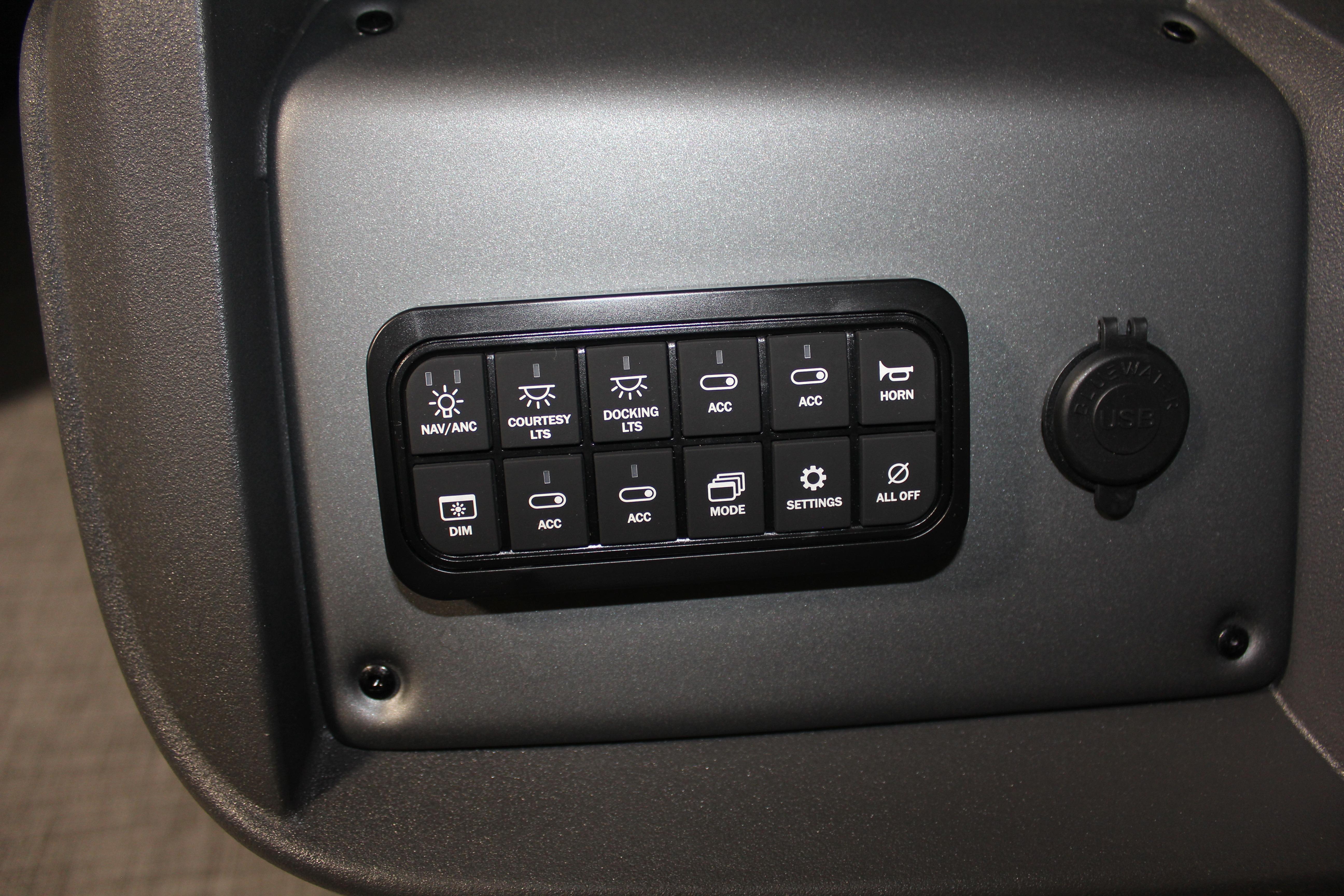 Control panel of 2026 Sun Tracker Party Barge 22 DLX with various function buttons.
