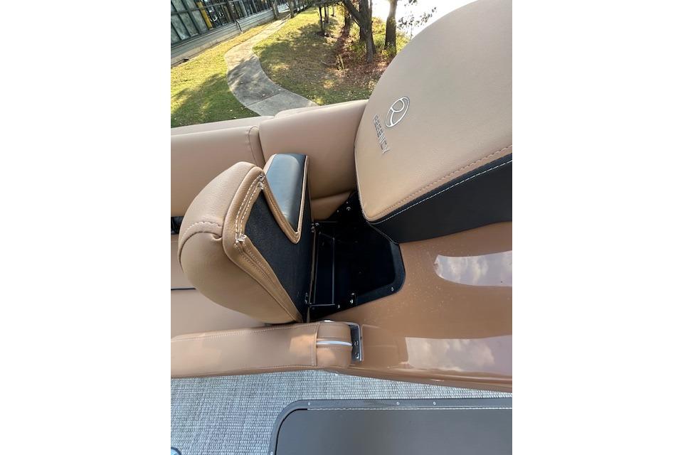 2025 Regency 230 LE3 Sport boat seat with tan upholstery and logo detail.
