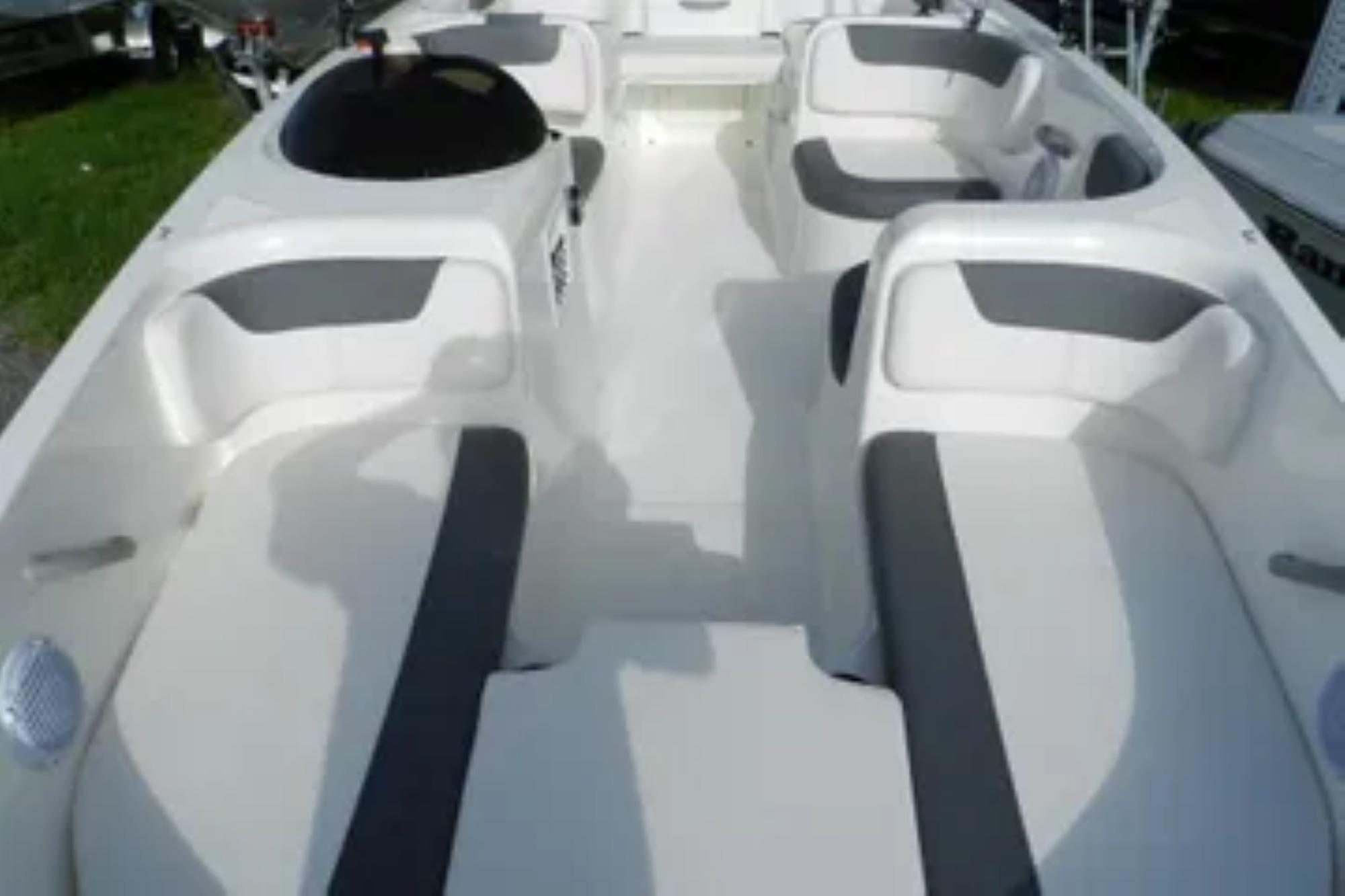 2026 Bayliner Element E18 boat interior with spacious seating and modern design.