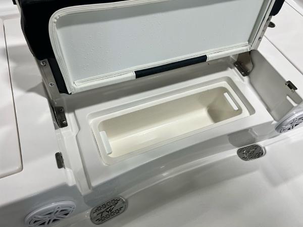 Open storage compartment on 2025 Tidewater 2300 Carolina Bay boat.