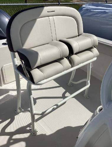 2022 Sailfish 220 CC boat seating, featuring dual cushioned seats and sturdy metal frame.