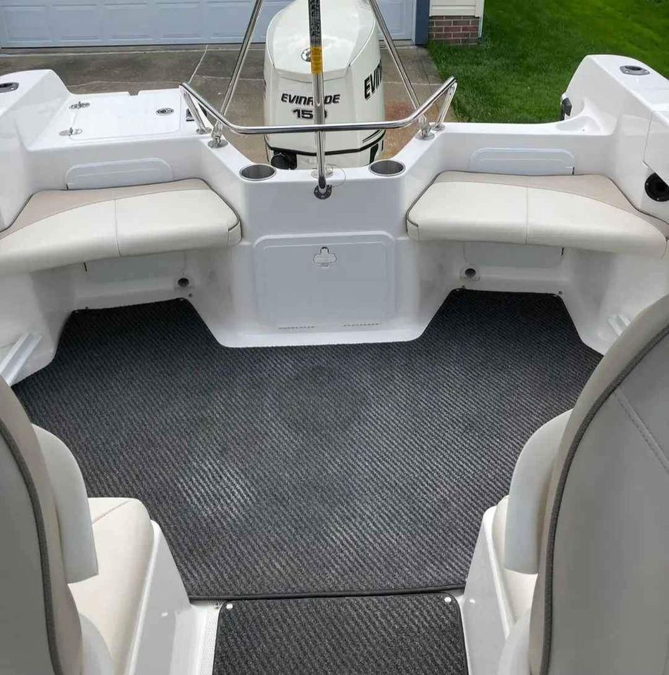 Interior of a 2012 Campion Explorer 542 Sport Cabin boat.