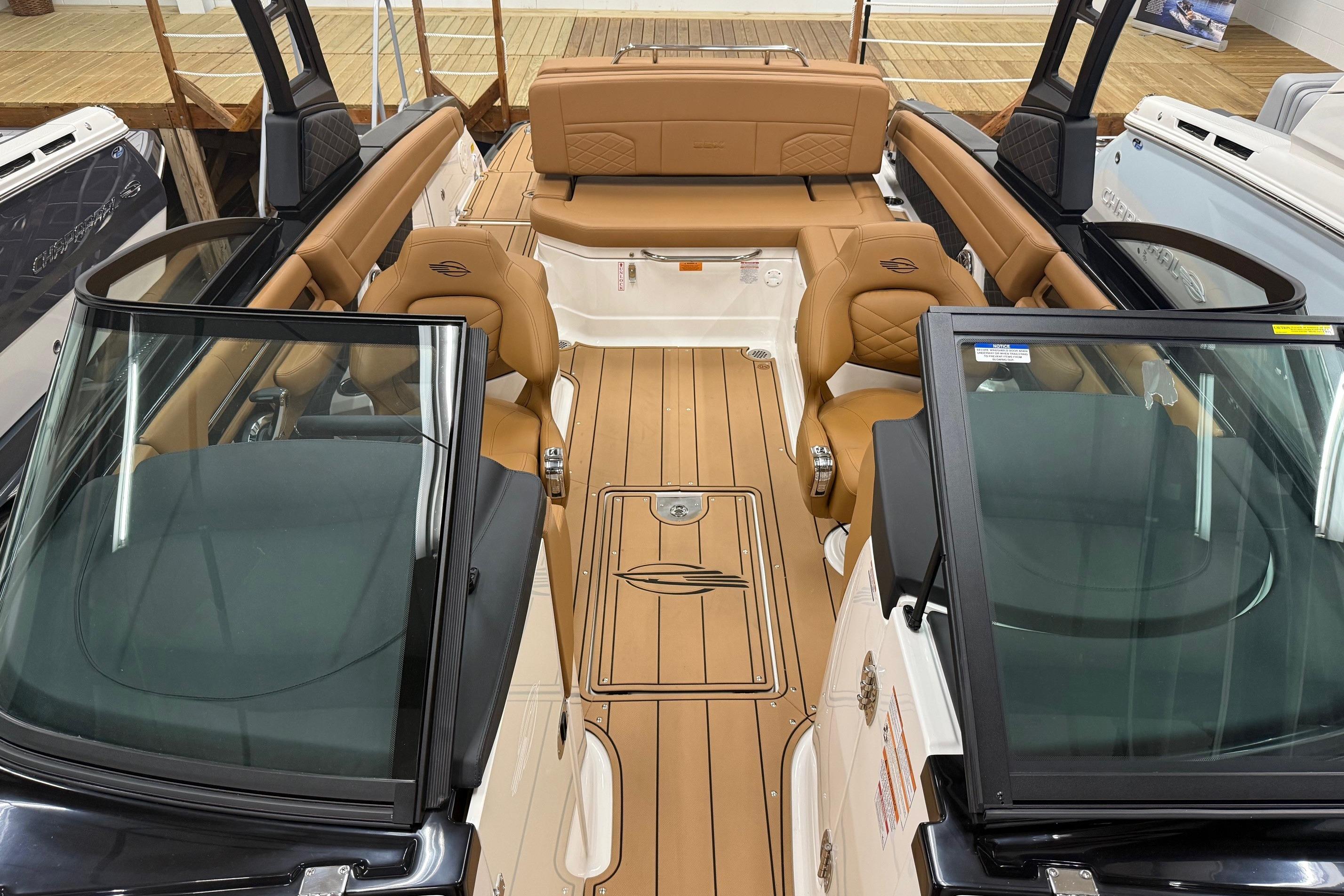 2026 Chaparral SSX 6 boat interior with tan leather seats and sleek design.