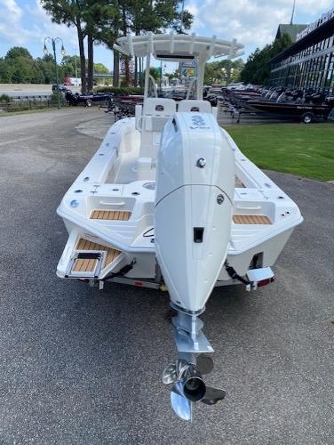 2024 Ranger 2600 Bay boat, rear view, parked outdoors.