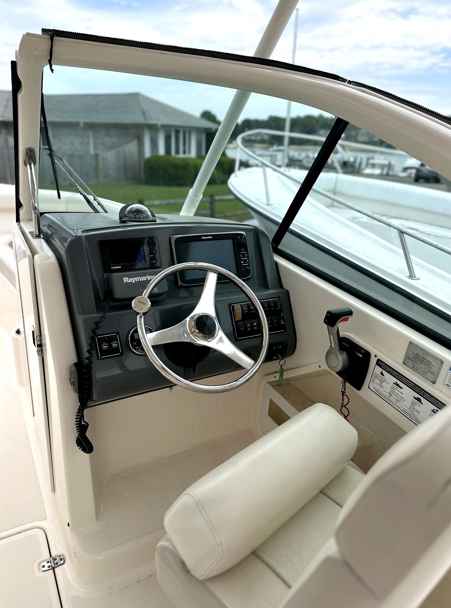 Helm of a 2012 Pursuit DC 265 Dual Console boat.