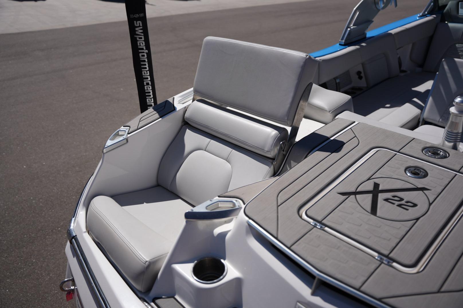 2020 MasterCraft X22 boat interior with luxurious seating and sleek design.