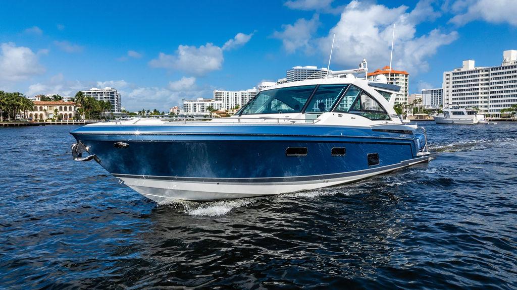 2019 Formula 430 All Sport Crossover boat cruising on a sunny day.