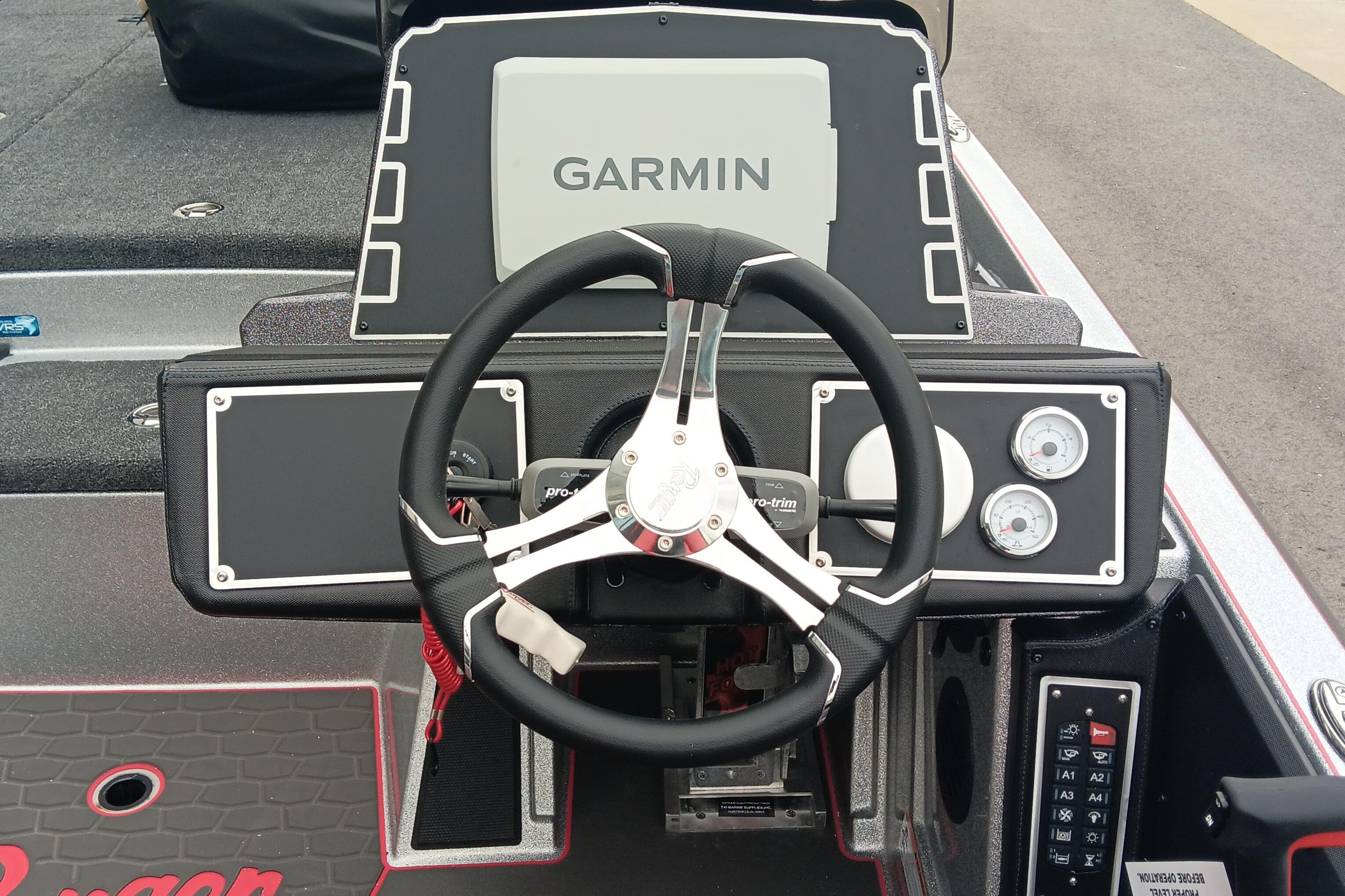 2026 Ranger Z520 boat dashboard with Garmin display and steering wheel.