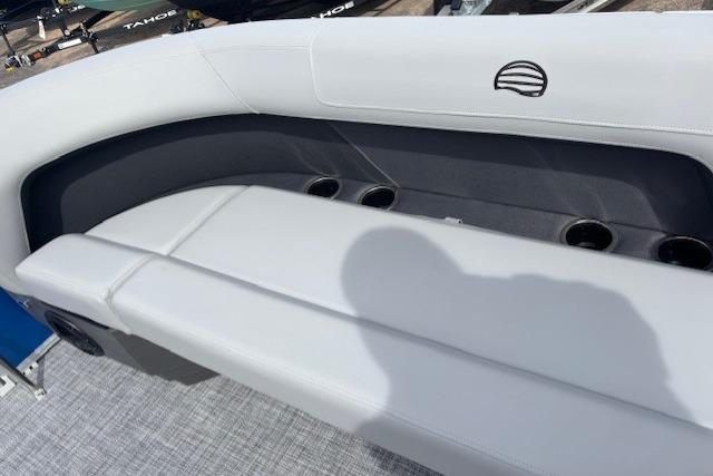 2026 Sun Tracker Party Barge 16 DLX boat seating with cup holders and sleek design.
