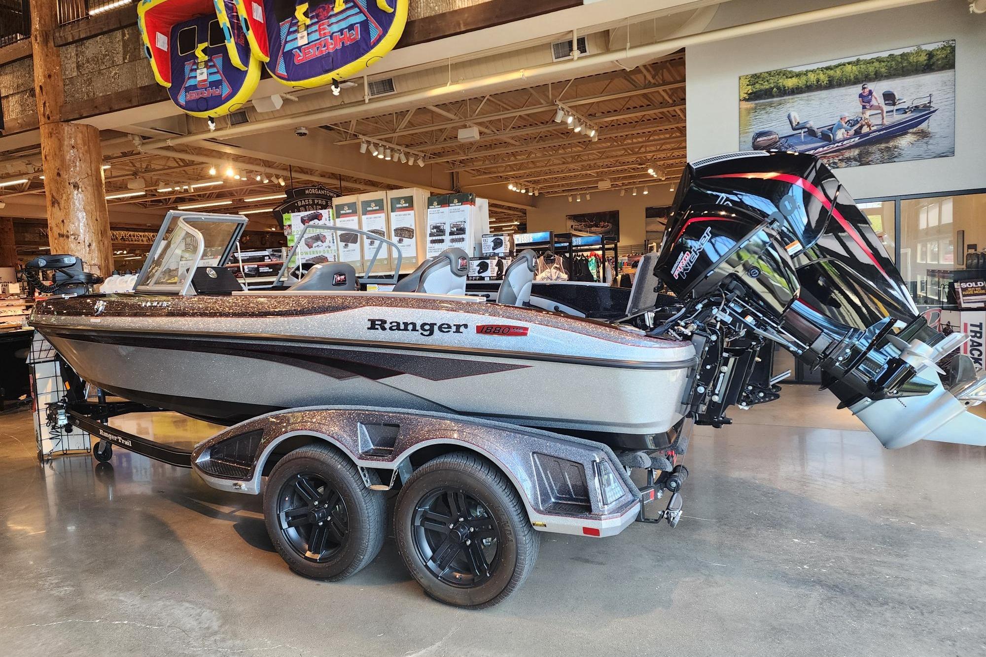2025 Ranger 1880MS boat displayed in a showroom with modern design and powerful engine.