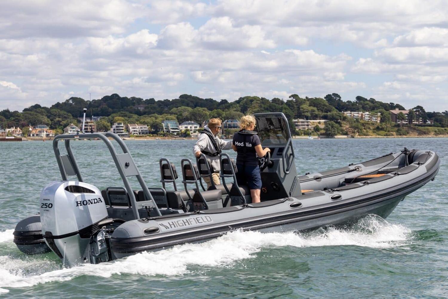 Manufacturer Provided Image: 2025 Highfield Patrol 760 boat cruising on water with Honda engine.