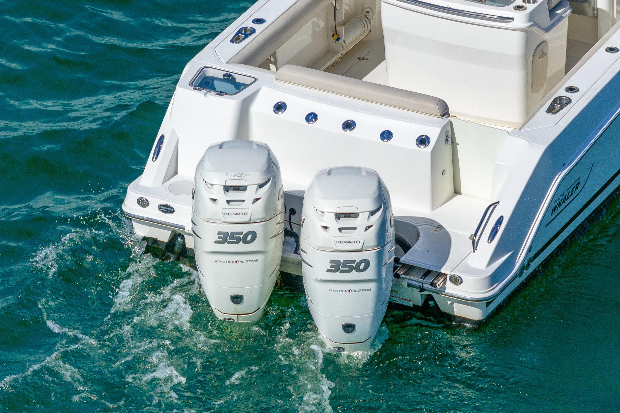 2016 Boston Whaler 280 Outrage with twin 350 Verado engines on water.