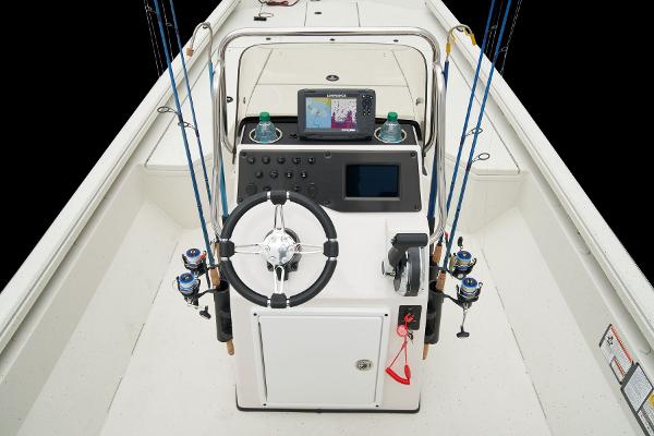 Manufacturer Provided Image: Manufacturer Provided Image: 2025 Ranger RB210 boat console with steering wheel, fishing rods, and navigation equipment.