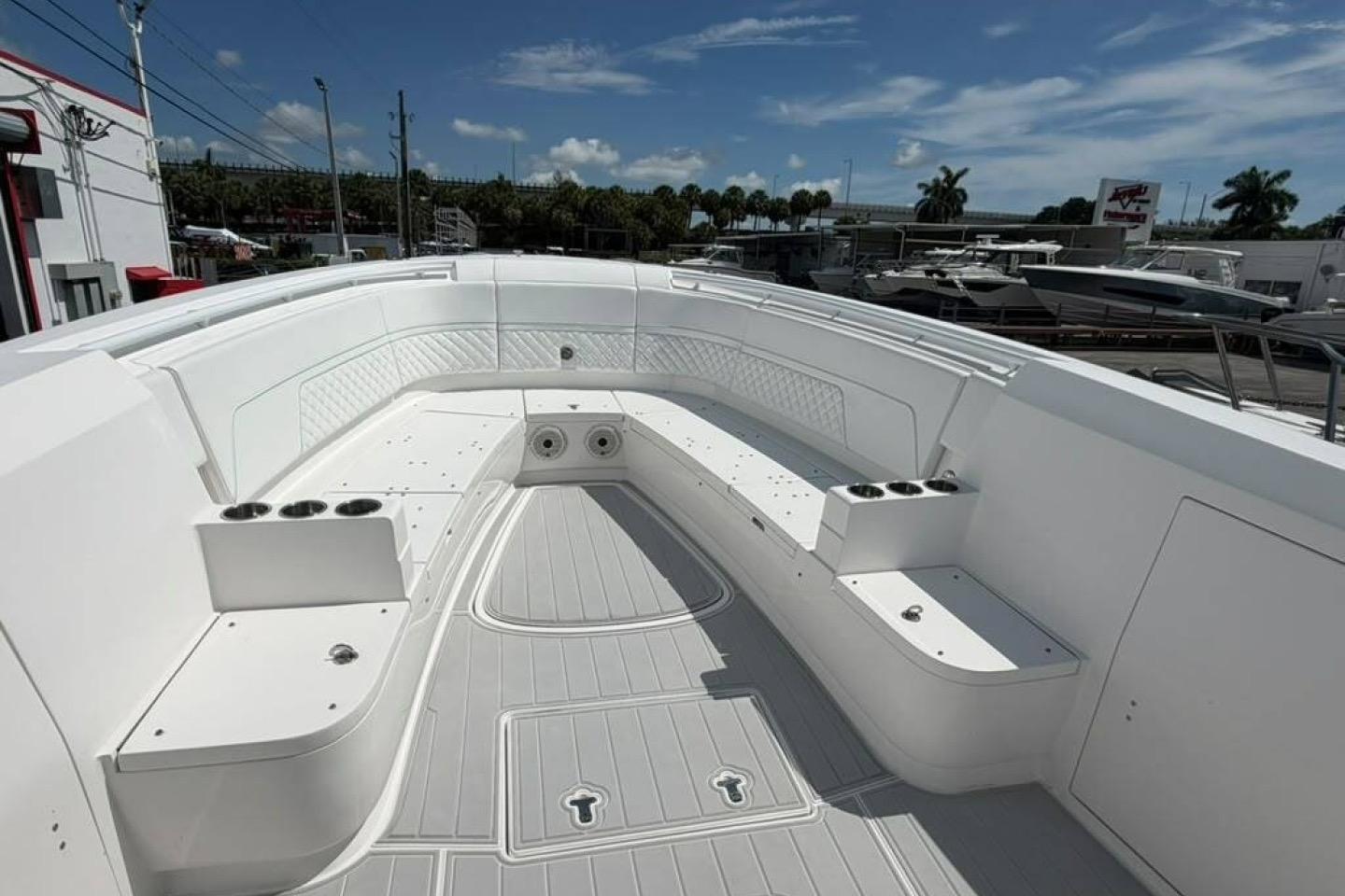 2020 Intrepid 375 Nomad SE boat interior with spacious seating and cup holders.