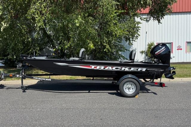 2026 Tracker Panfish 17 boat on trailer, parked outdoors, side view.