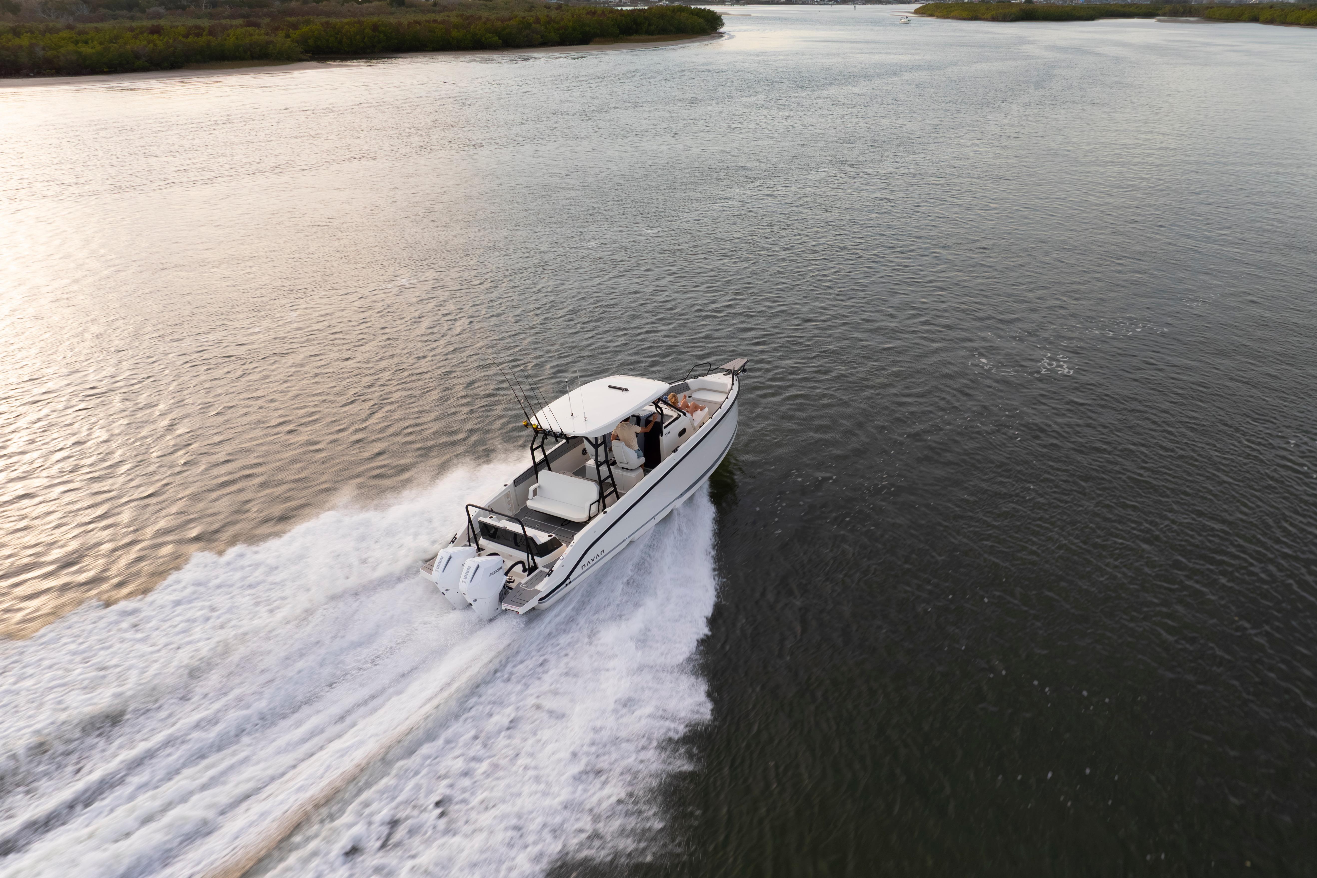 Navan T30 boat cruising on a serene river, 2027 model.