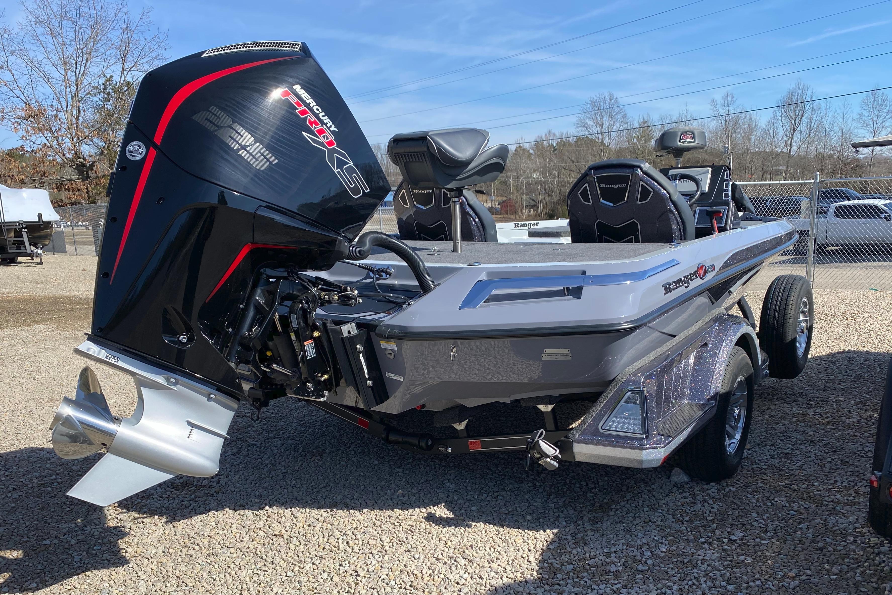 2026 Ranger Z519R boat with Mercury Pro XS 225 engine, parked outdoors.