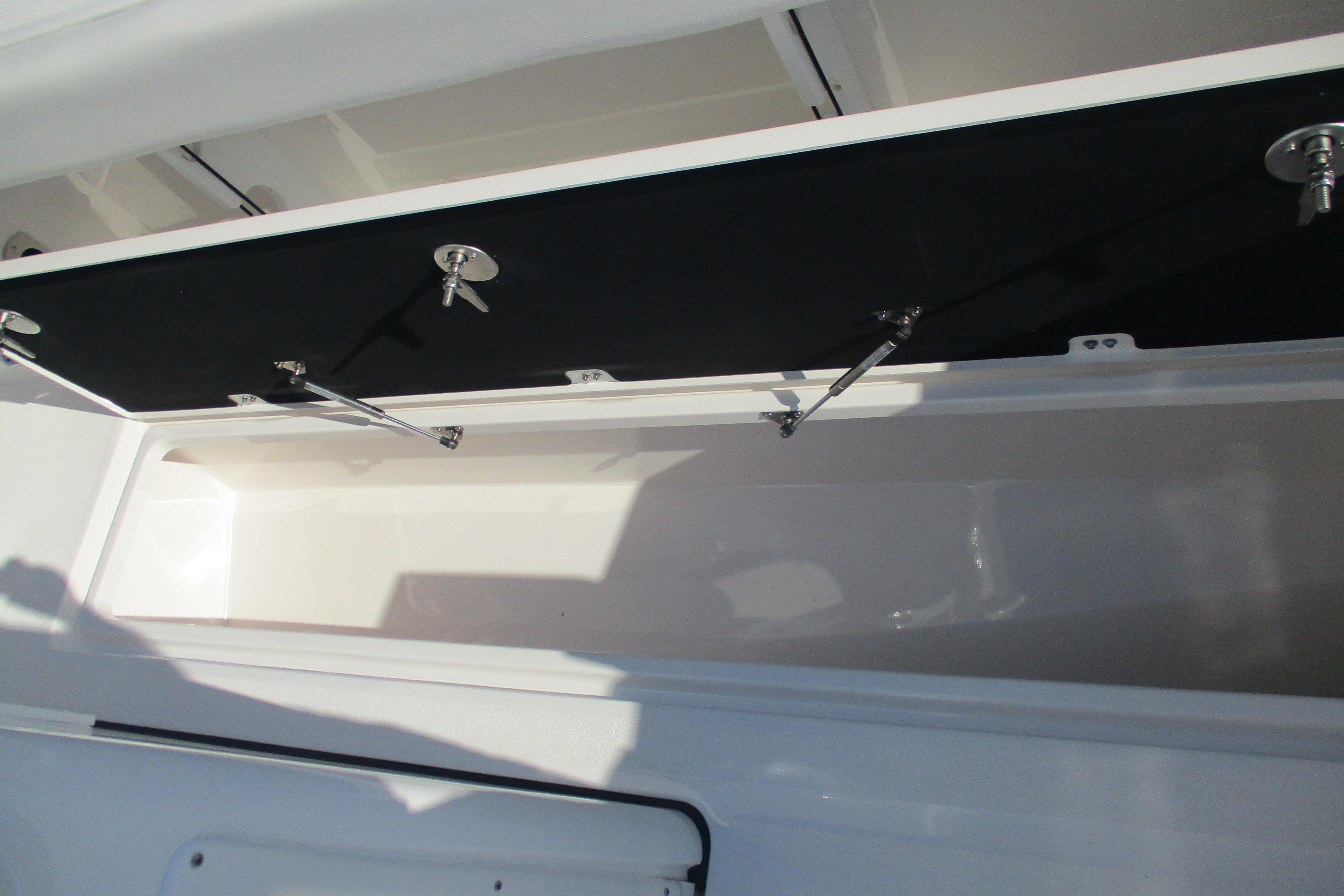 Open storage compartment on 2026 Sea Fox 328 Commander boat.