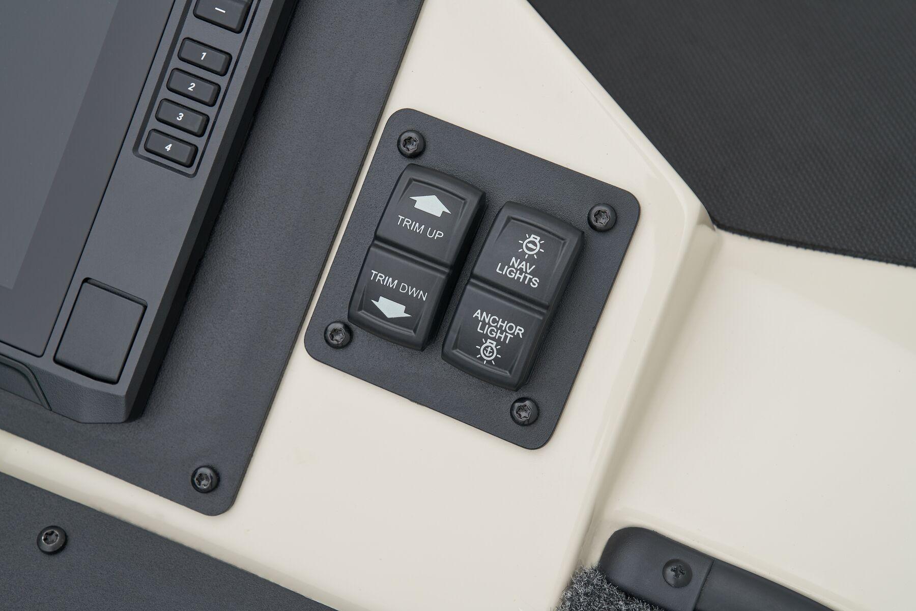 Manufacturer Provided Image: Control panel of 2026 Ranger Z185 boat with trim and light switches.