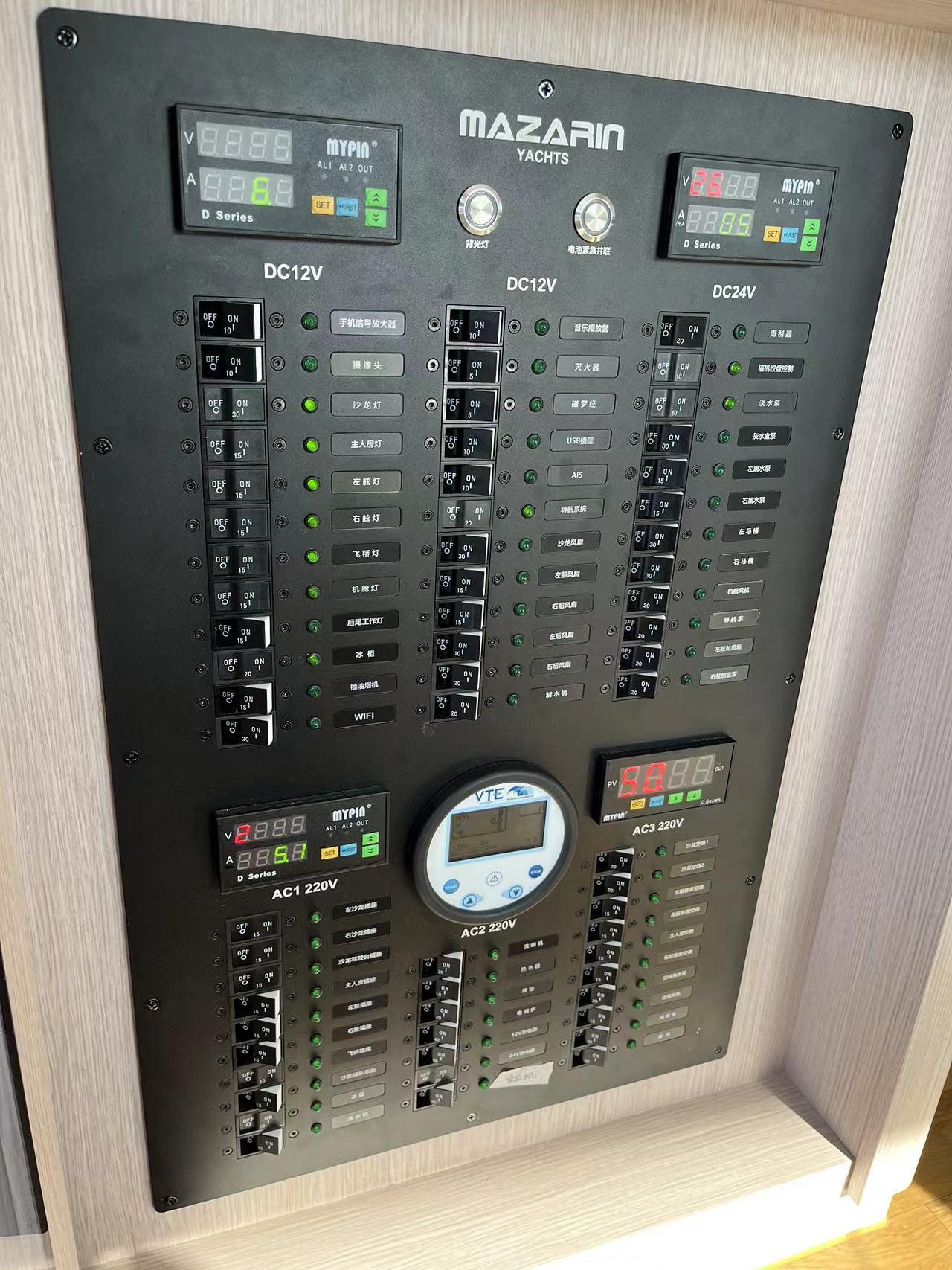 Mazarin 55 Catamaran 2023 control panel with switches and displays.