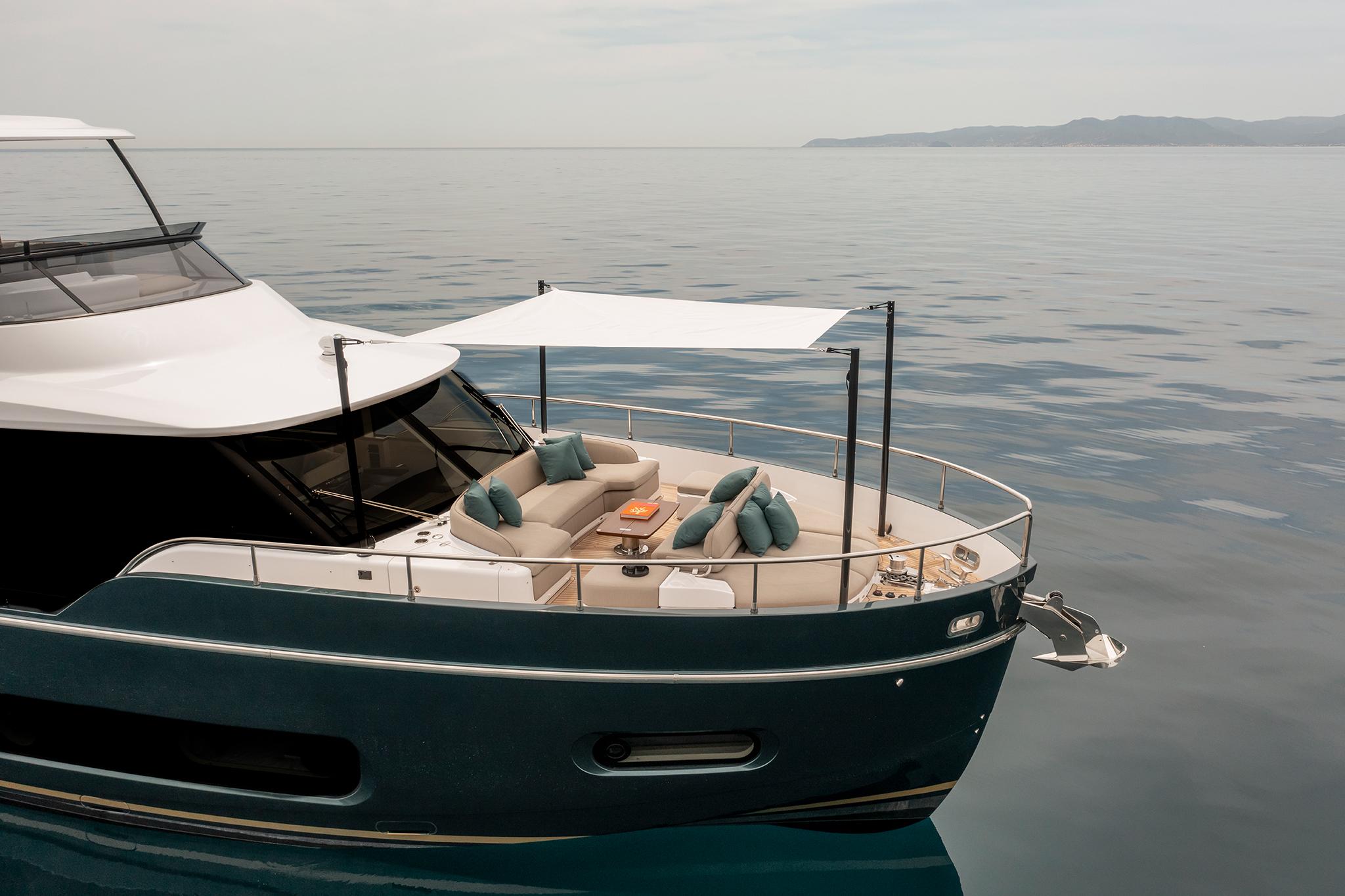 Azimut Magellano 60 yacht, 2025 model, featuring a luxurious deck with seating and canopy.