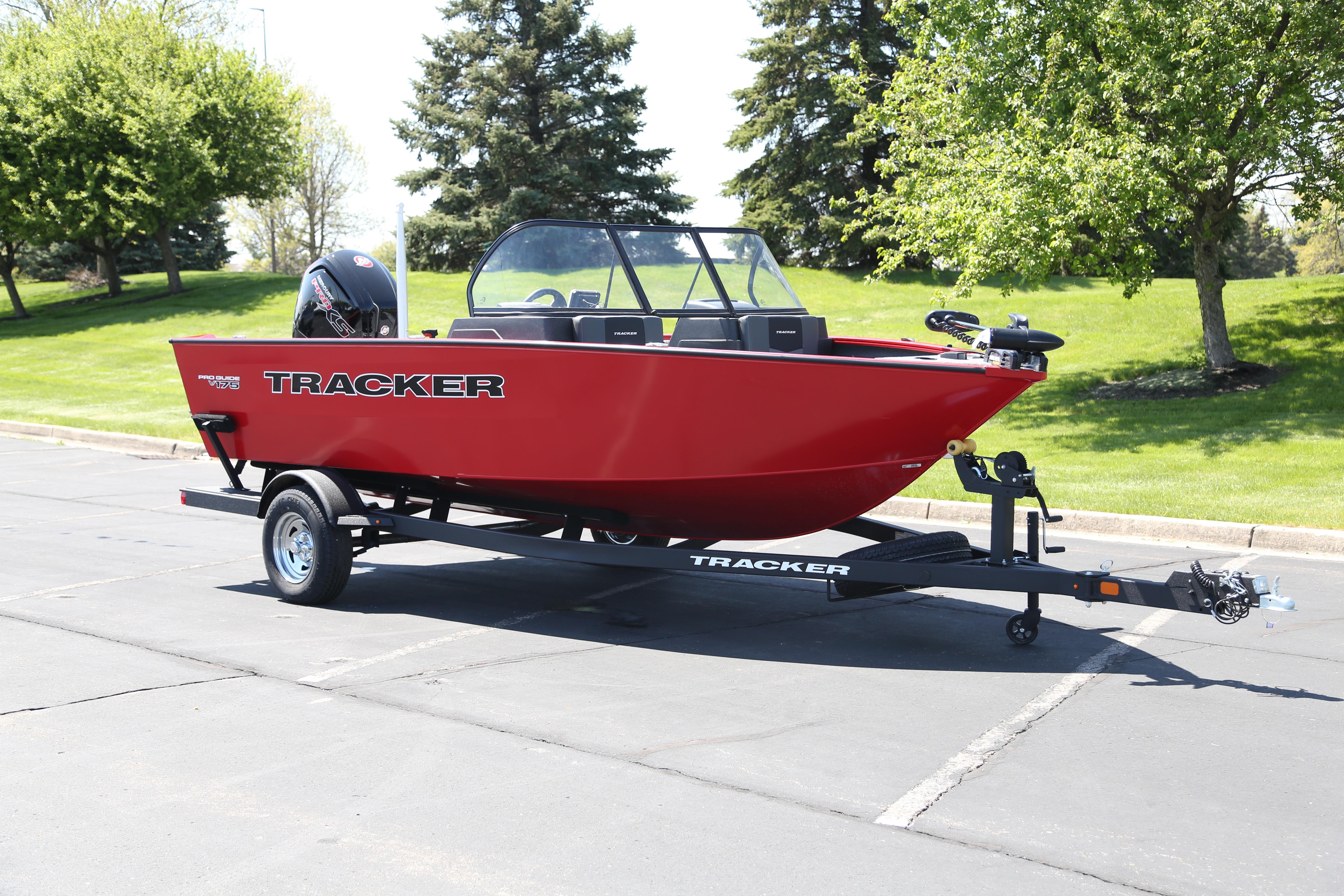 2026 Tracker Pro Guide V-175 Combo boat on trailer, parked outdoors.