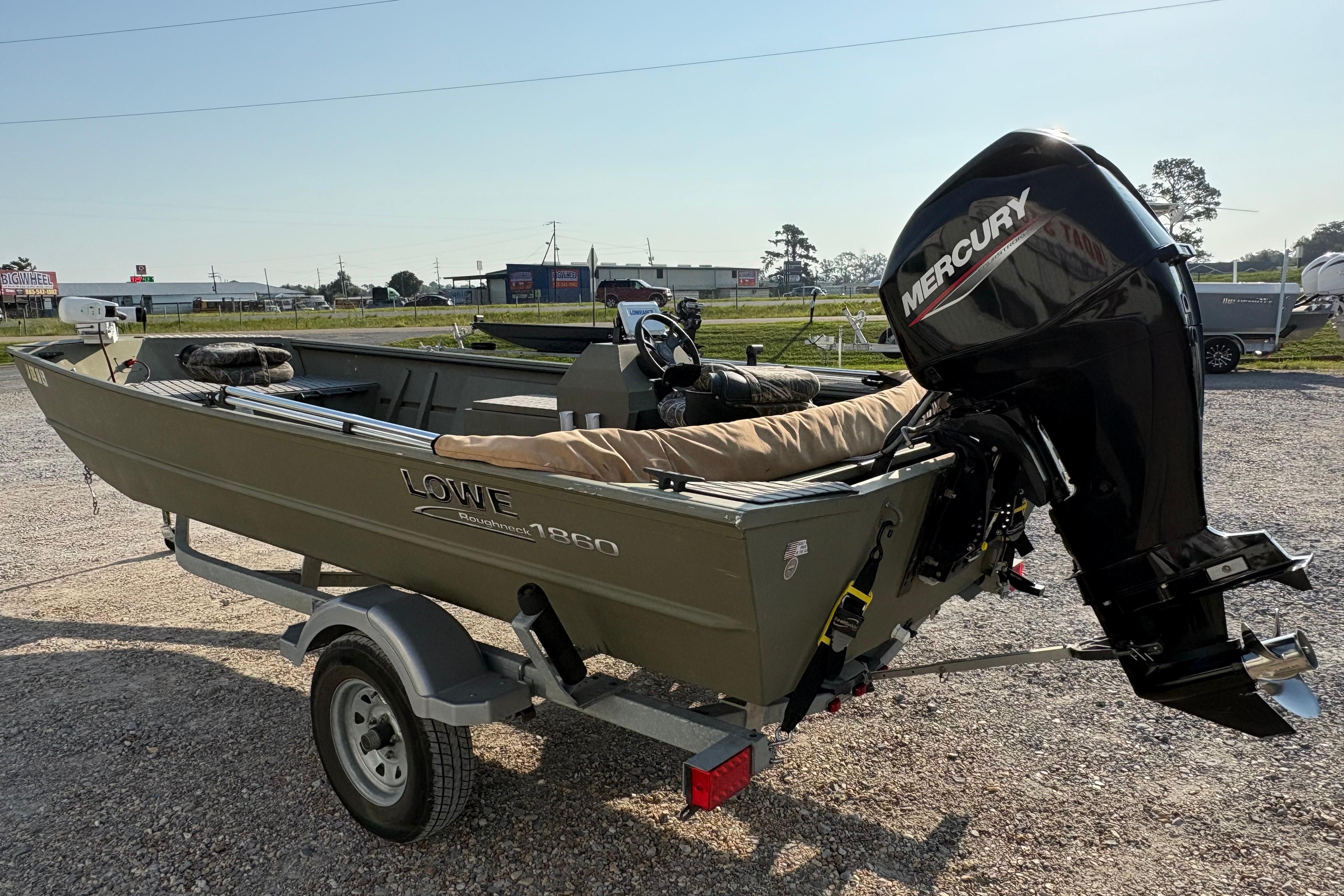 2019 Lowe Roughneck 1860SC boat with Mercury engine on trailer.