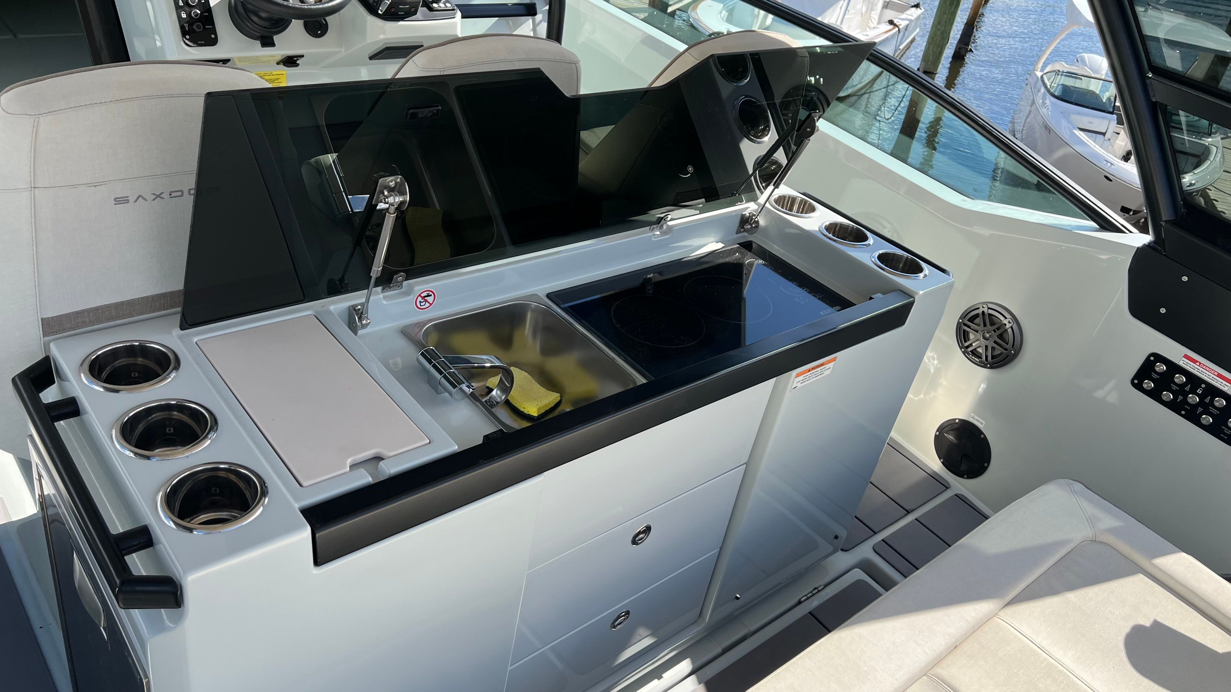 Interior of 2024 Saxdor 320 GTO featuring modern kitchenette.