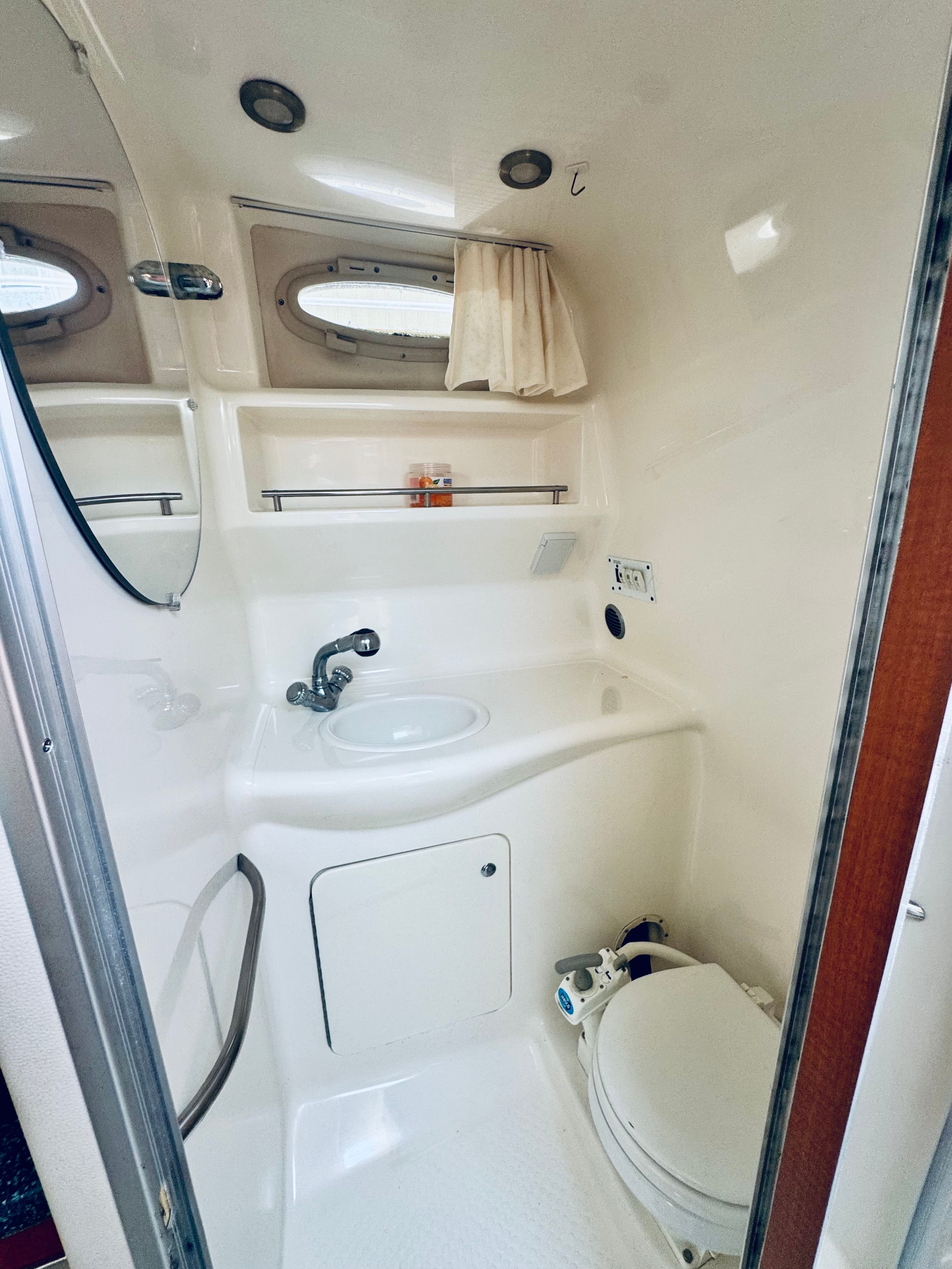 Interior of Chaparral Signature 270 yacht, bathroom view, year 2005.