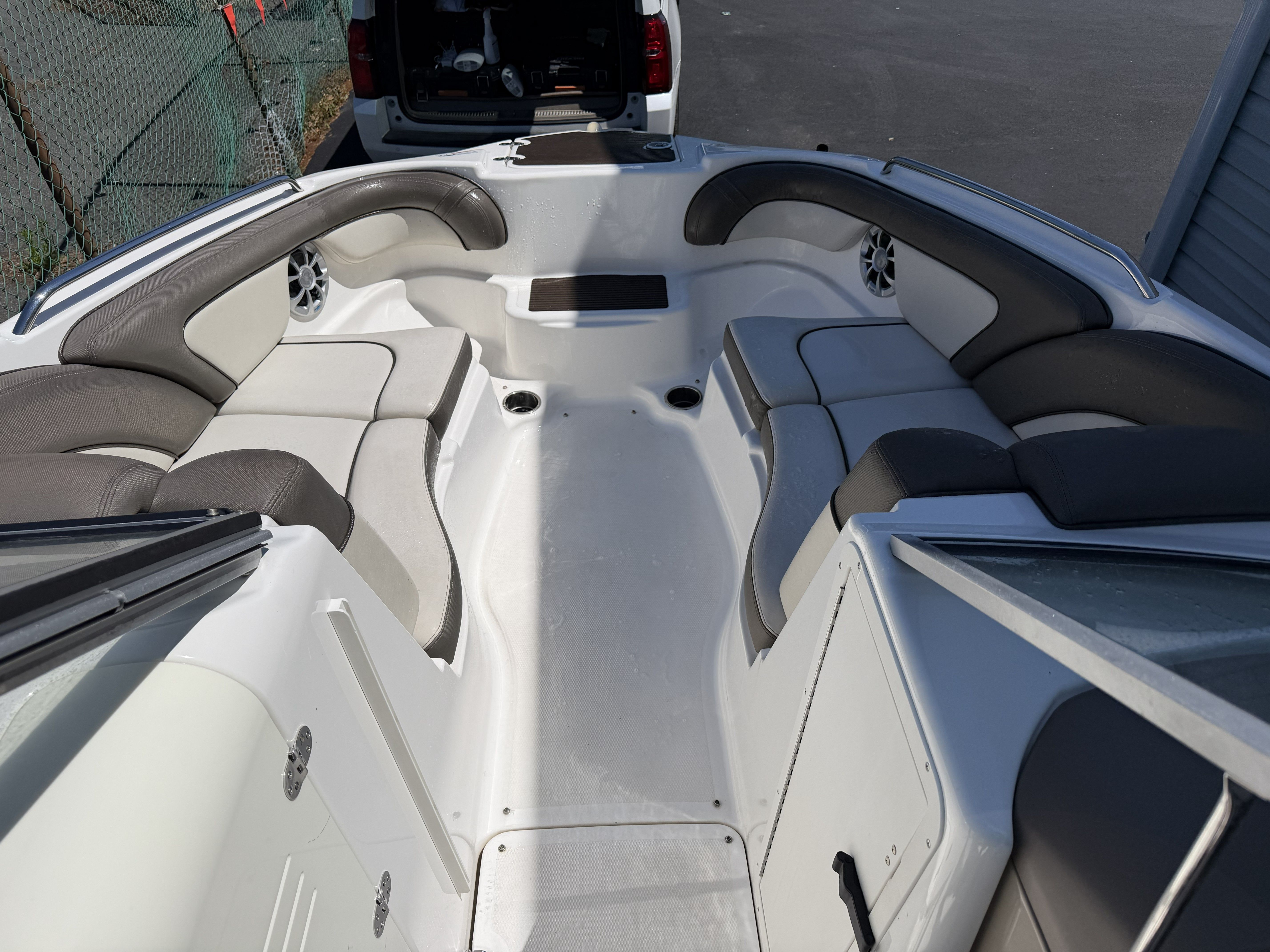 Interior of a 2012 Yamaha Boats 242 with gray seating.