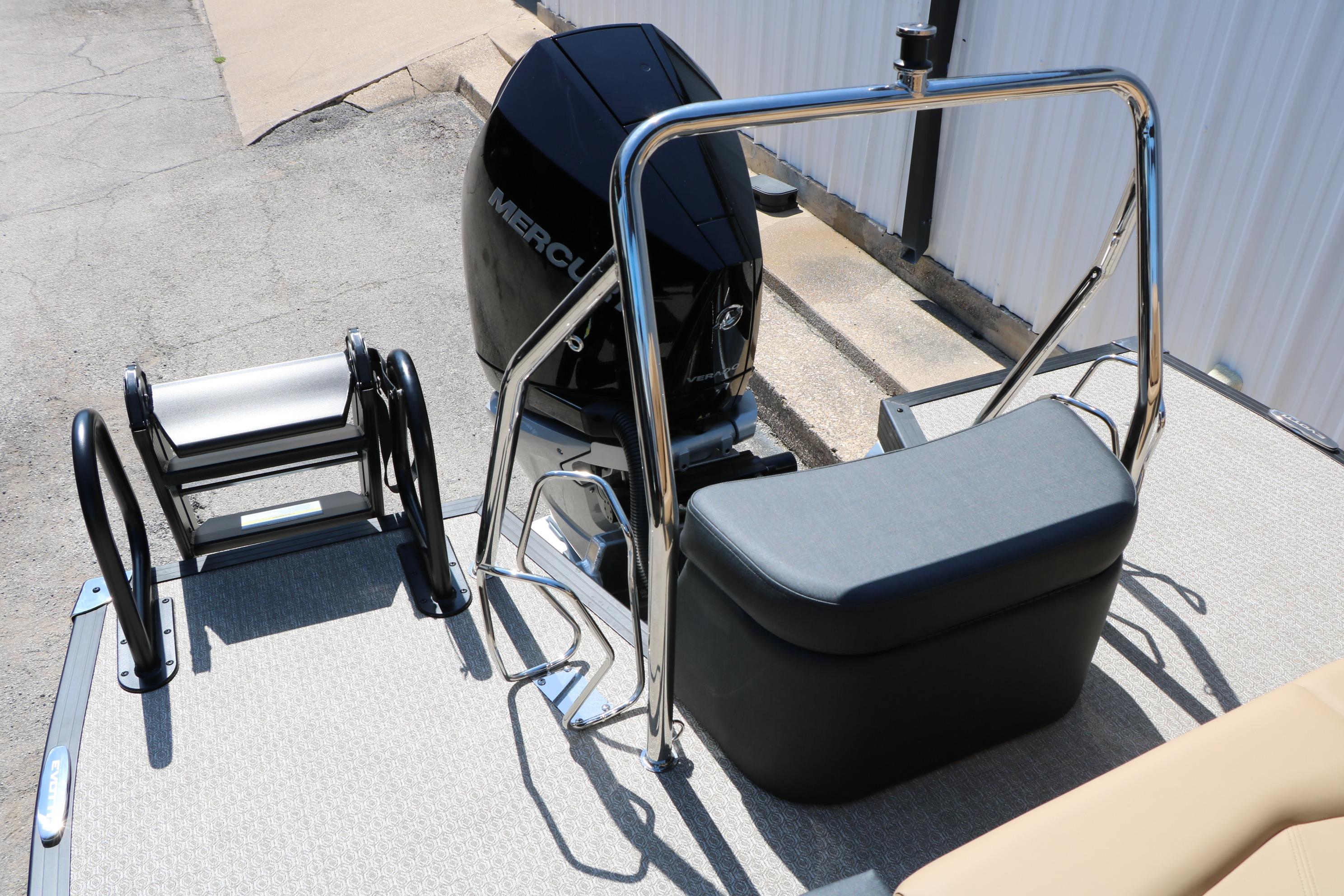 2026 Evotti 725 CS Tri-Toon boat with Mercury engine and swim ladder.