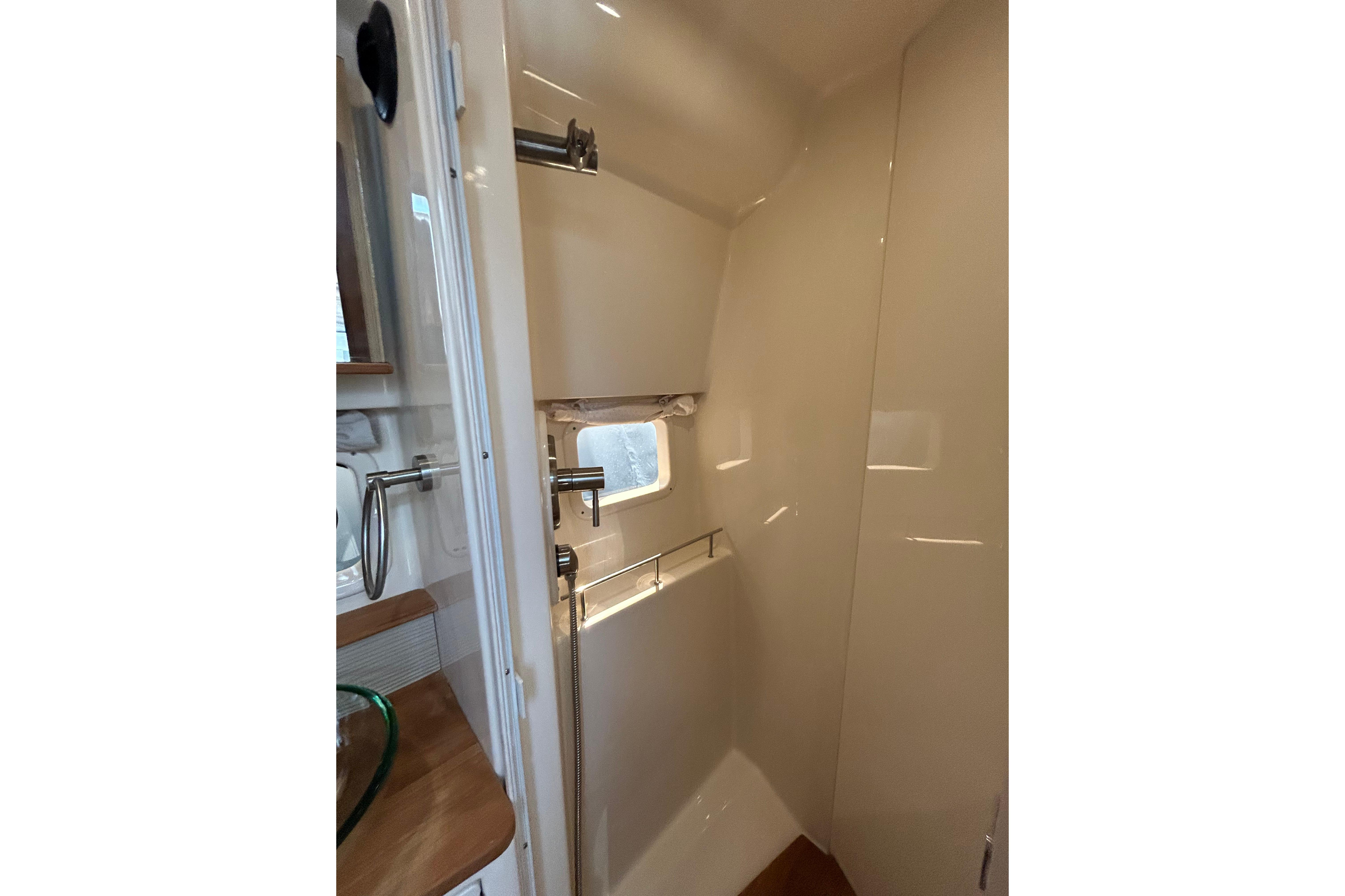 Interior of 2019 Sea Ray Sundancer 350 yacht bathroom with modern fixtures.