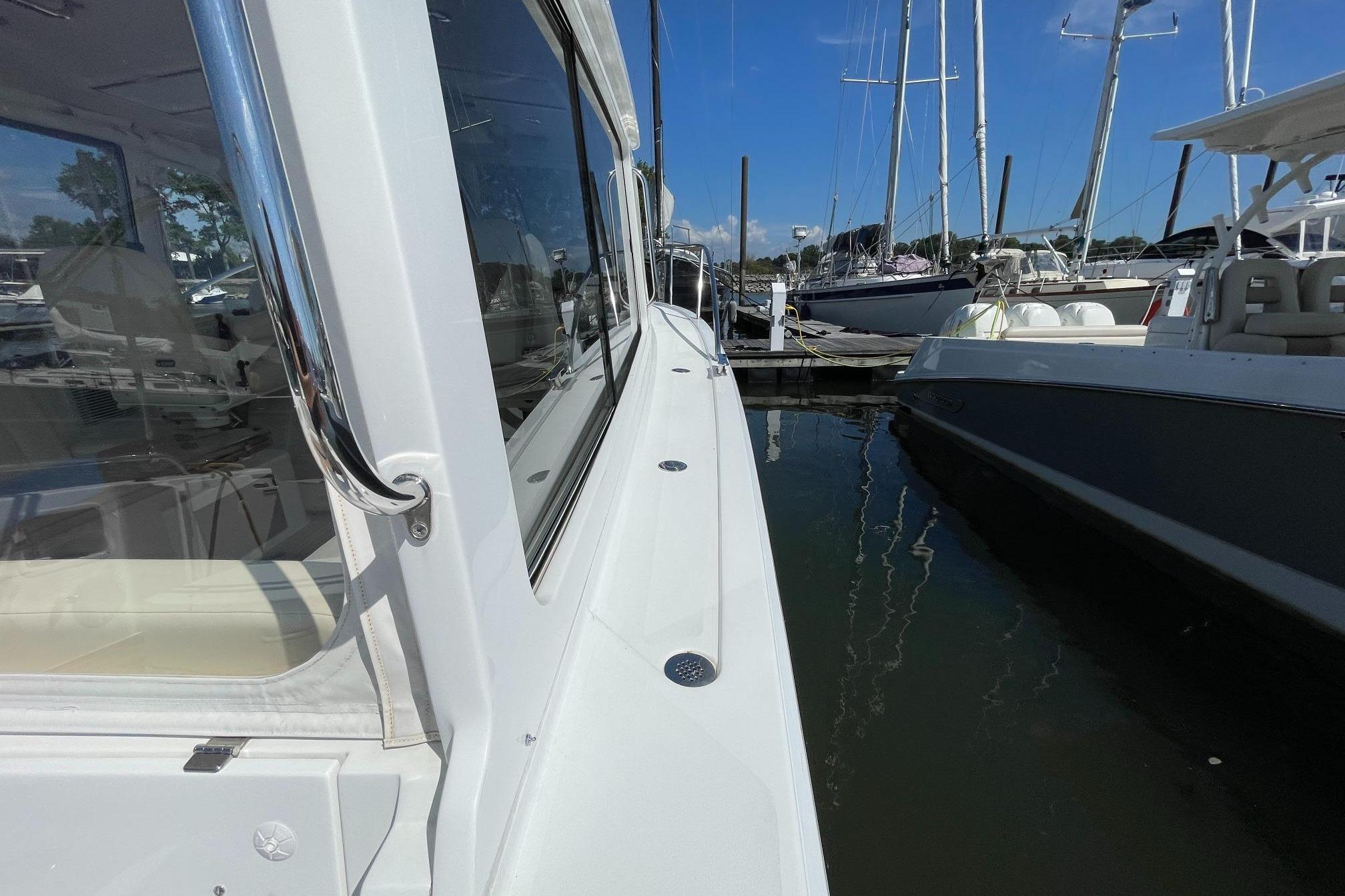 2023 MJM 35 yacht docked at marina, showcasing sleek design and modern features.