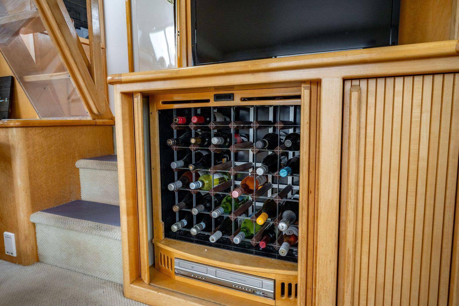 Wine rack inside Navigator Sundance 5600 yacht, 1997 model.