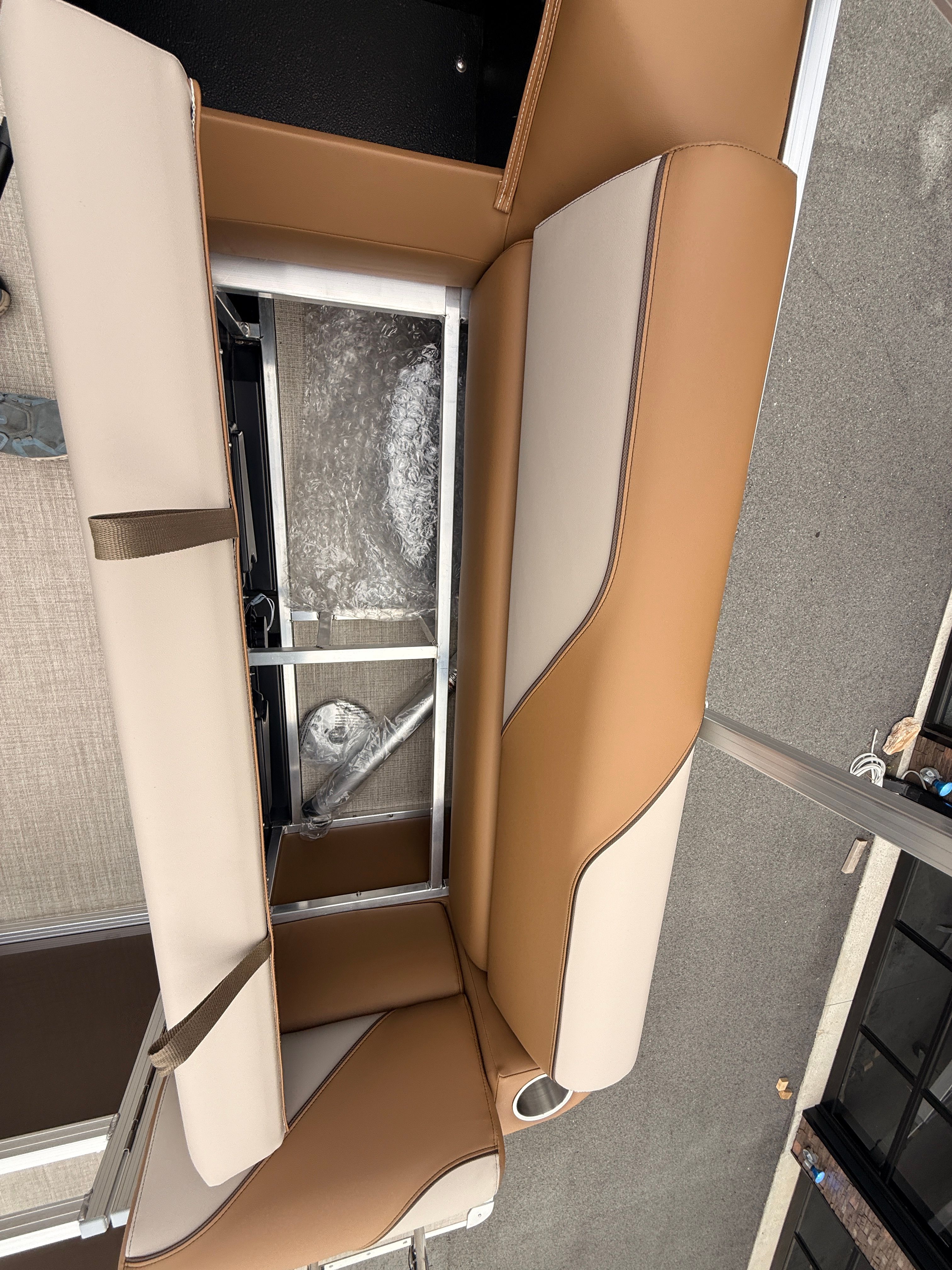 Interior view of 2026 Tahoe 2380 Sport Quad Lounger boat seat.