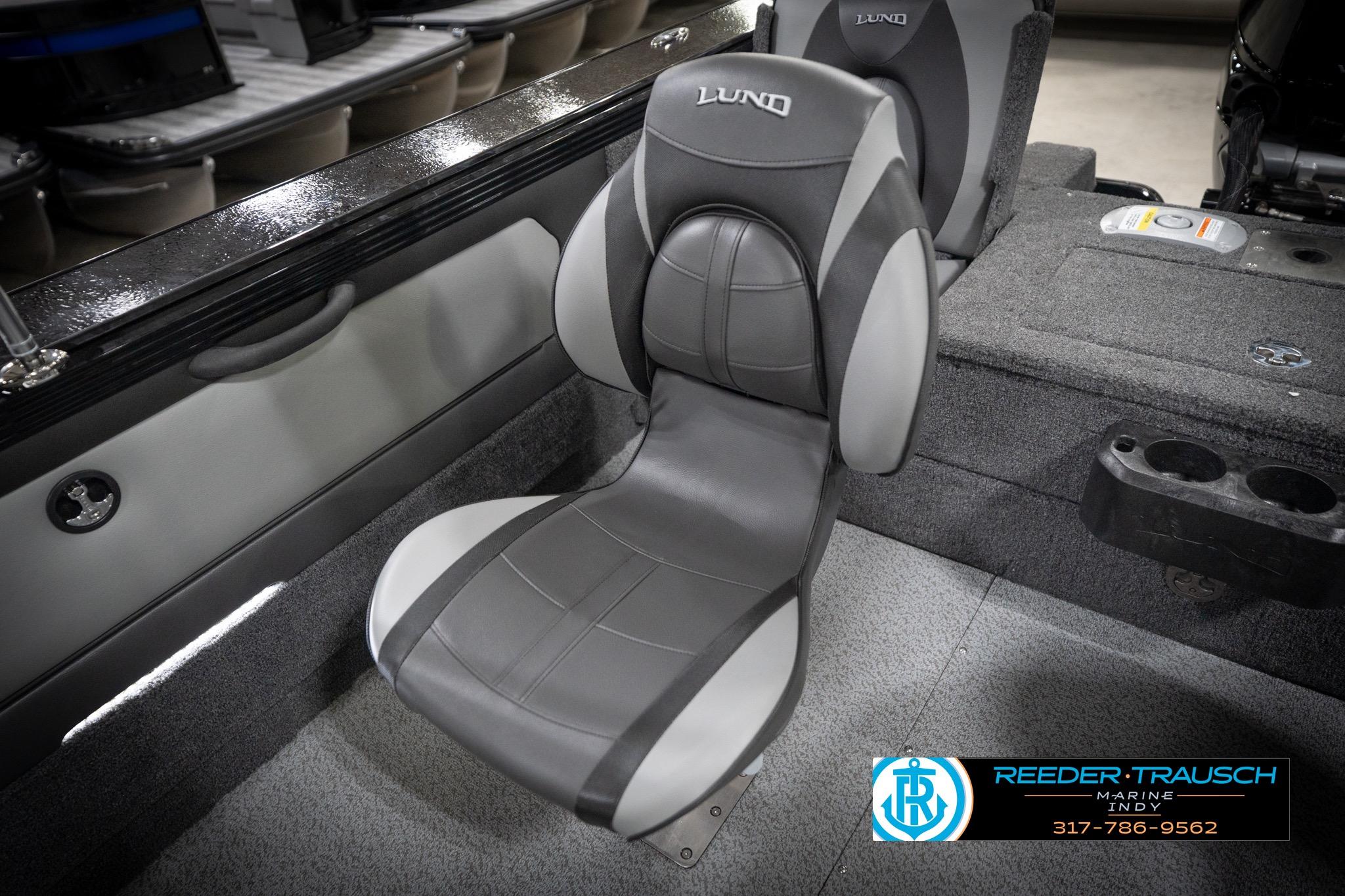 2026 Lund 2275 Baron boat interior with gray seating and cup holders.
