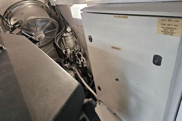 Engine room of a 2005 Sunseeker Manhattan 66 yacht, featuring electrical components and ventilation.