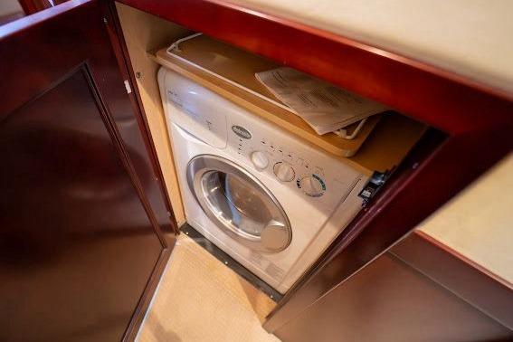 Built-in washing machine on 2006 Sea Ray 580 Sedan Bridge yacht.