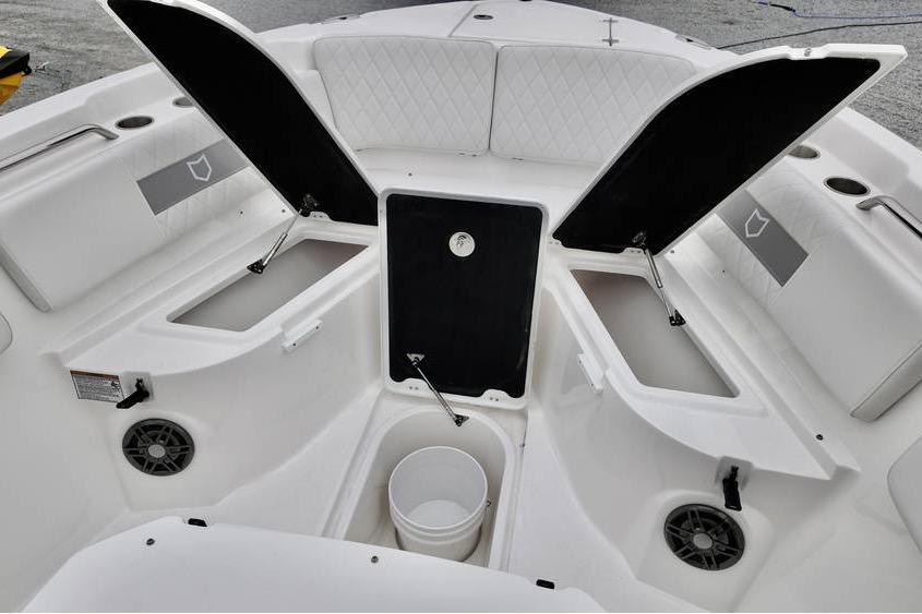 2026 Sea Fox 268 Commander boat interior with open storage compartments and seating.