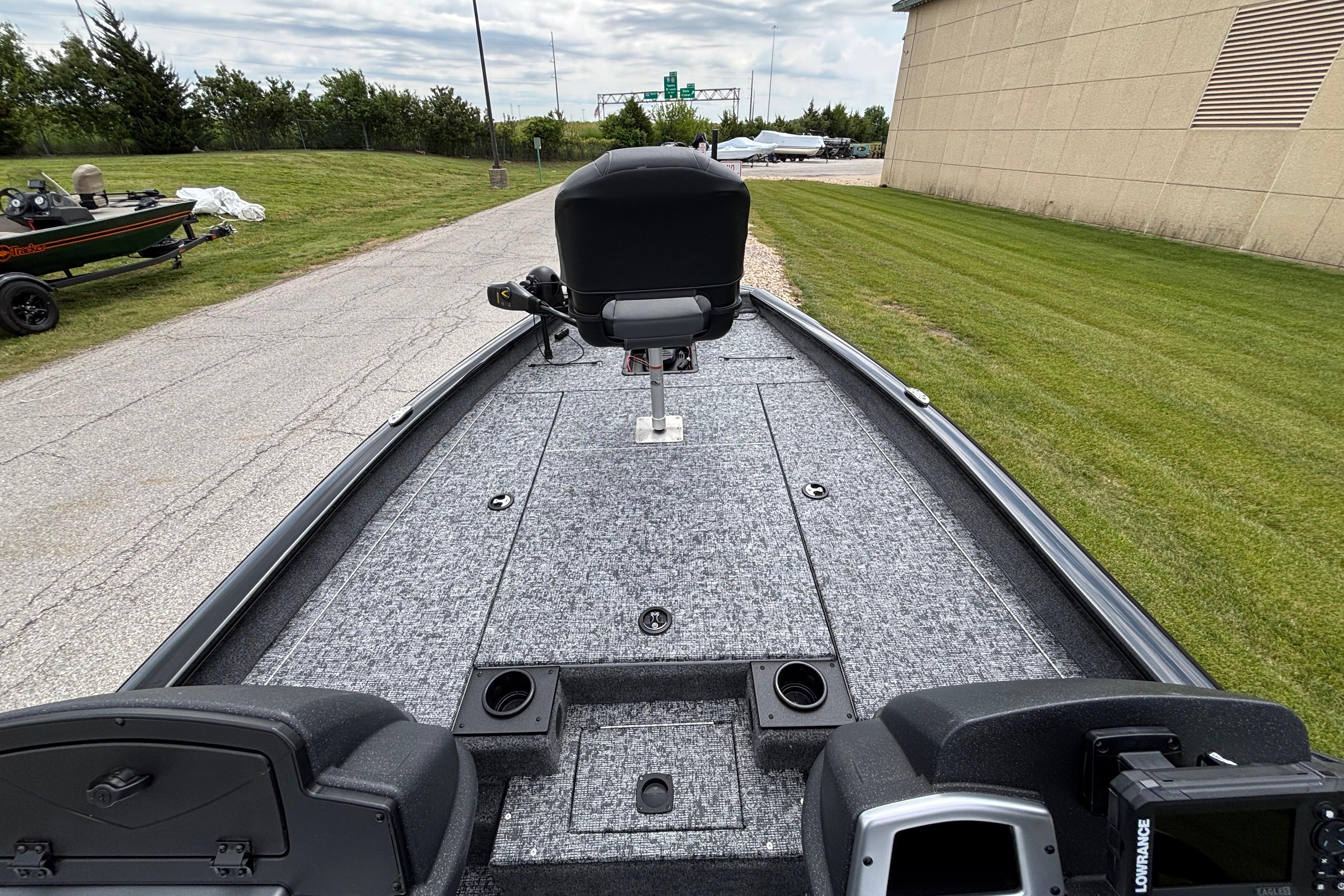 2026 Tracker Pro Team 190 boat interior with carpeted deck and seating.