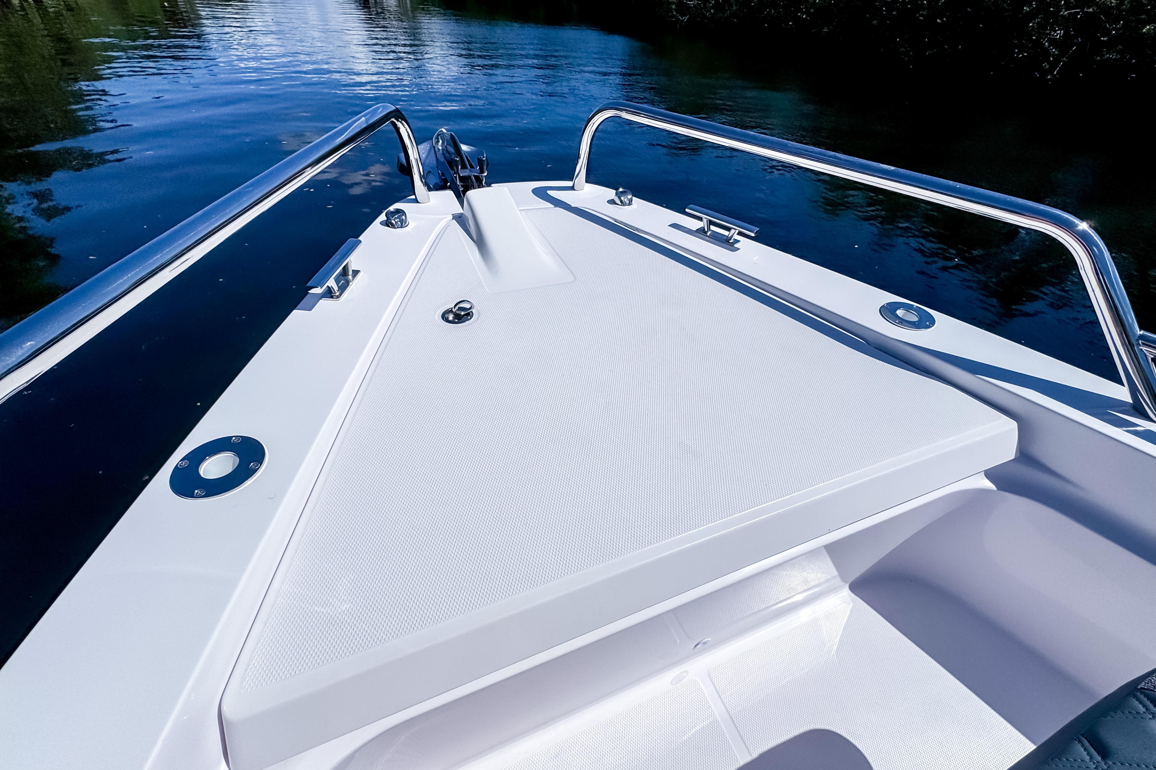 2024 Axopar 37 Sun Top boat deck with sleek design and stainless steel railings.