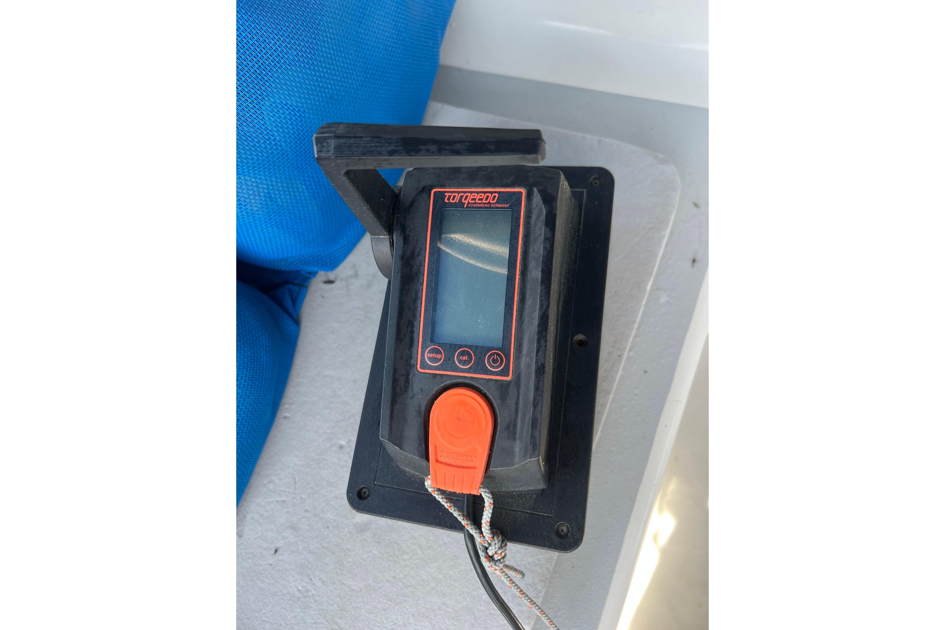 Control panel on a 1993 Corsair F-27 sailboat, featuring a Torqeedo motor interface.
