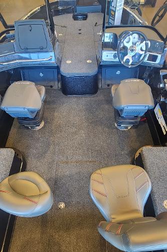 2024 Nitro ZV21 boat interior with seating and steering wheel.