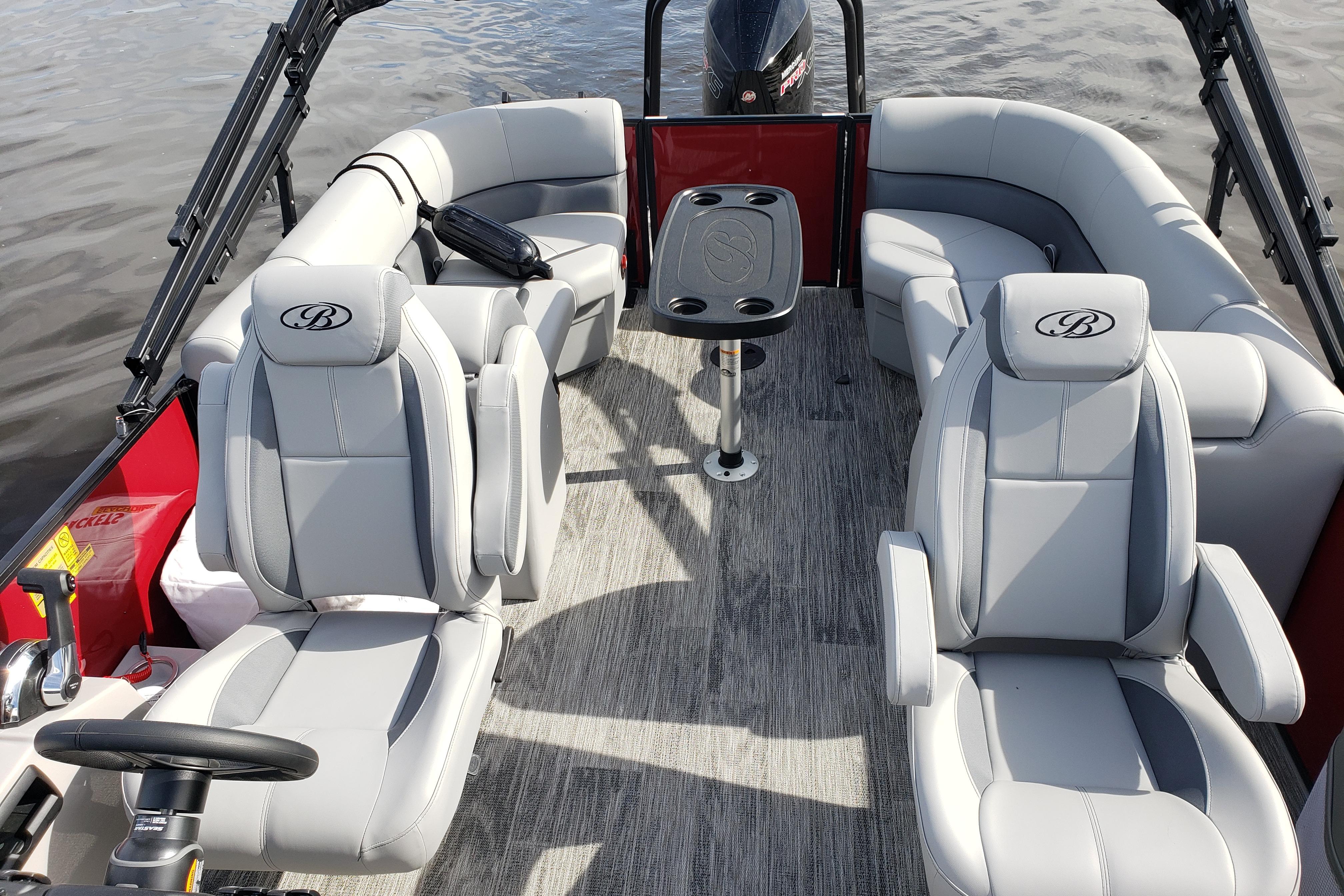 2026 Bentley Pontoons Legacy 243 Navigator Ext with luxurious seating and modern design.
