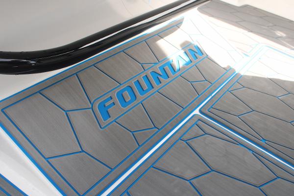 2024 Fountain 34 SC boat deck with blue accents and logo.