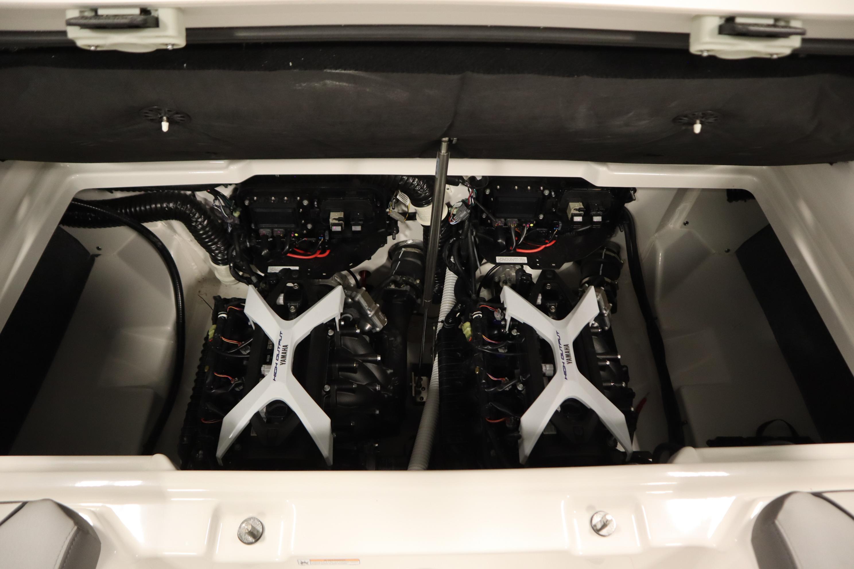 2026 Yamaha Boats AR250 engine compartment showcasing dual engines and advanced mechanics.