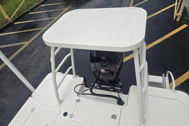 2026 Mako 18 Pro Skiff boat with motor and elevated platform.
