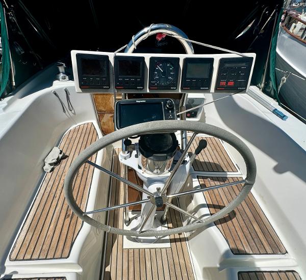 Steering wheel and instrument panel of 1996 Beneteau Oceanis 40 CC sailboat.